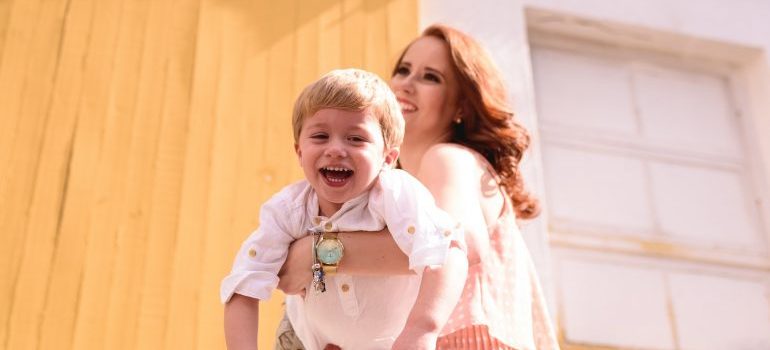 mother and son playing in the backyard