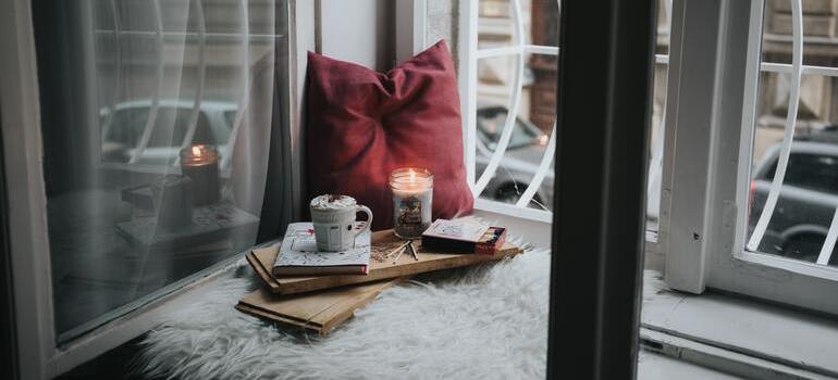 A cozy reading corner with a chair and books