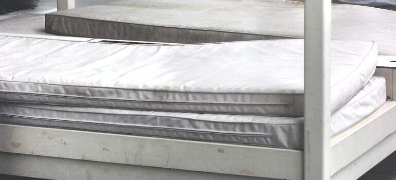 White mattress ready to be sealed in a mattress bag for the move