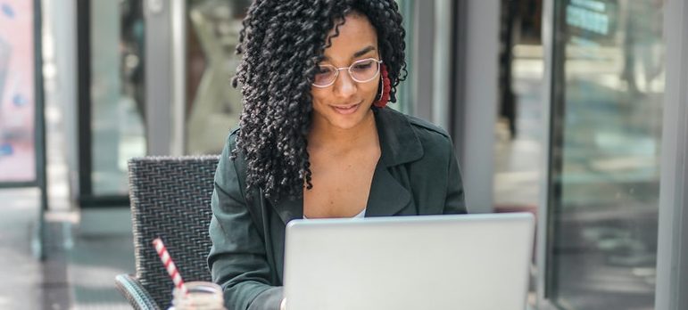 a woman creating a plan for moving from Tennessee to New York
