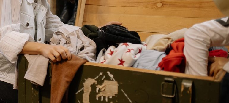 a woman sorting old stuff