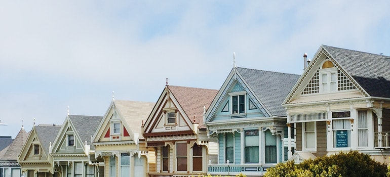 A row of houses in a quiet neighborhood, a good place to try tips for befriending new neighbors