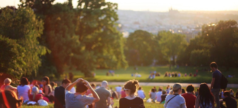 People enjoying the sunset in park