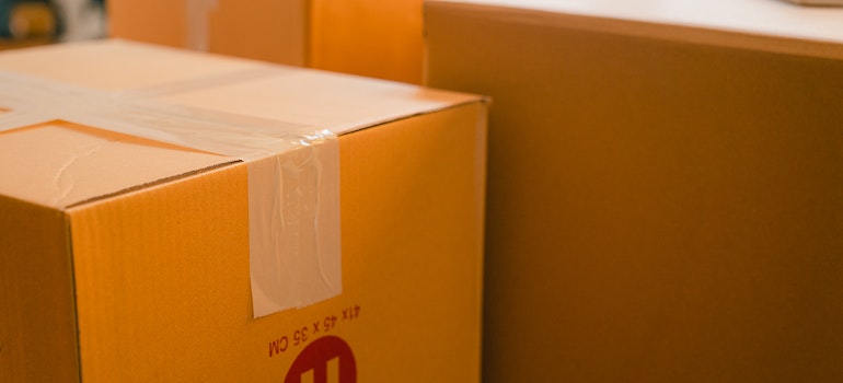 Taped moving boxes ready for storage during a home renovation