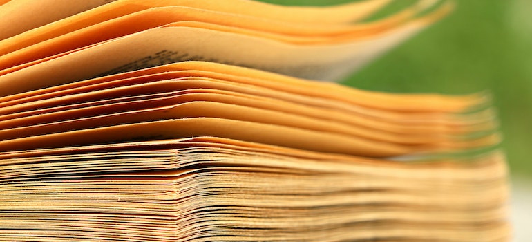 Stack of important personal documents and papers