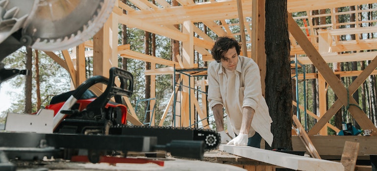 A carpenter working at a construction site, a trade business that does well in Mississippi