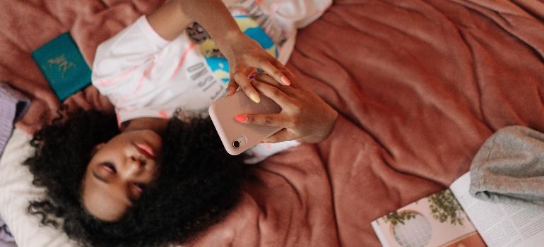 Teenage girl looking at her phone