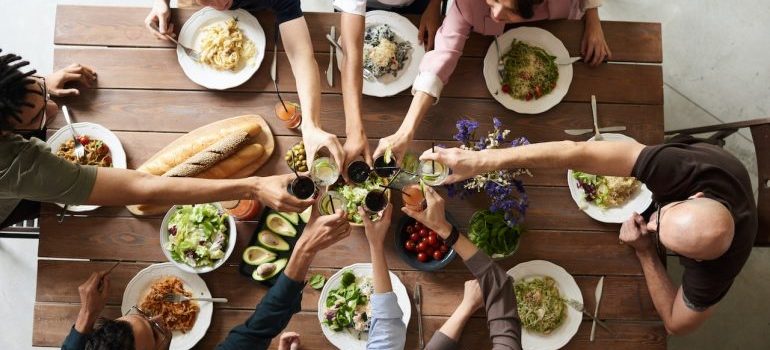 A group of people sharing a meal around a table