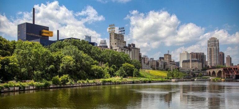 A river and a city skyline, illustrating what to know before moving to Mississippi
