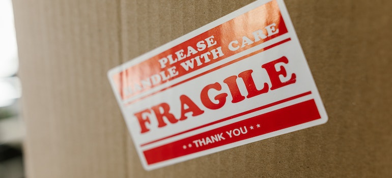 A moving box with a label that says fragile