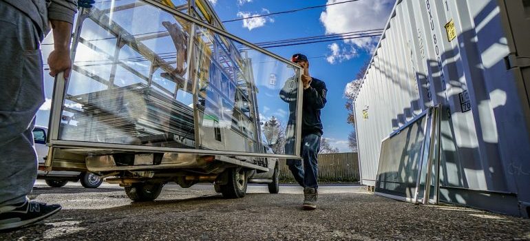 movers transporting windows