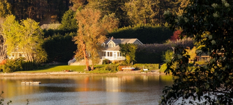 House in the forest by the lake.