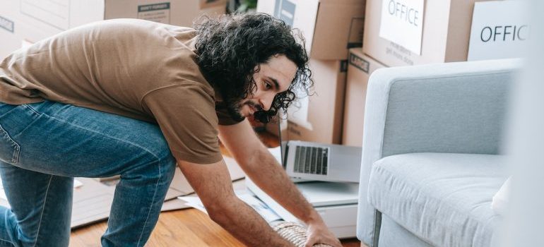 A man packing boxes for a fresh start in Westminster