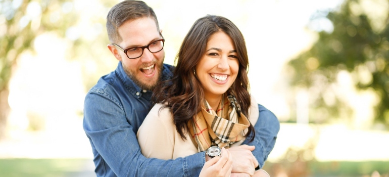 Smiling couple after choosing a new home in Mississippi