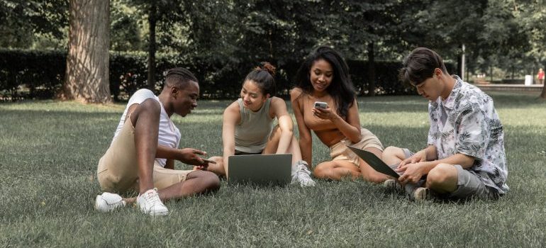 A group of friends spending time together at the park