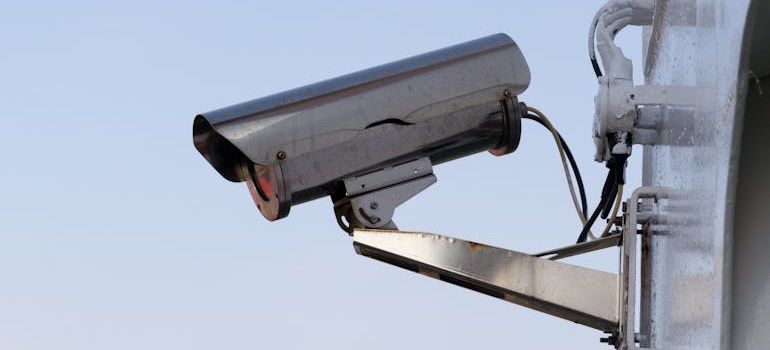 A security camera on a wall