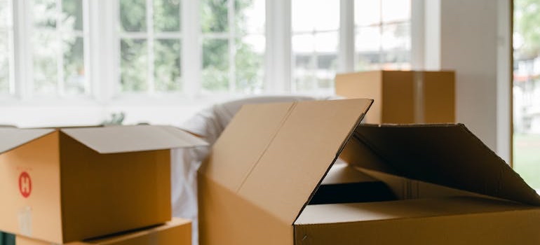 Moving boxes ready to pack seasonal decorations for a move