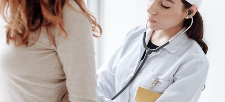 A patient talking with a doctor during an appointment