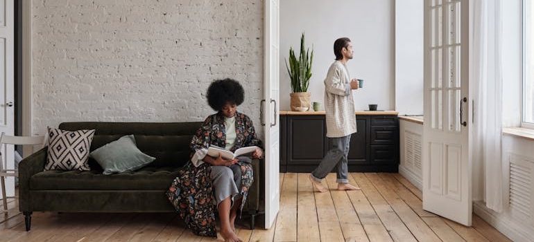 A person relaxing in a home after they have your house professionally cleaned before moving in