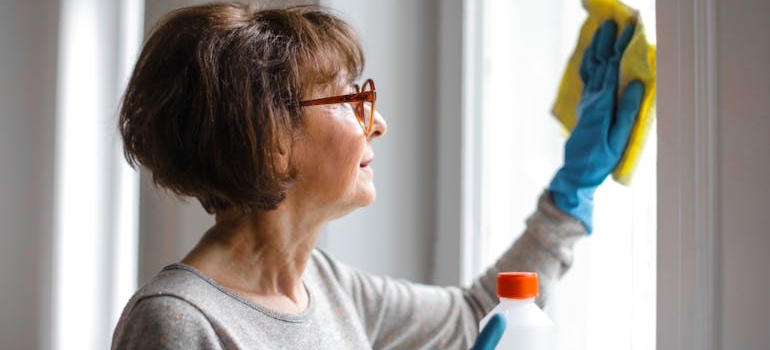 A person cleaning a home