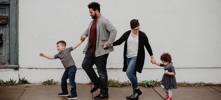 Parents and children spending time together at home