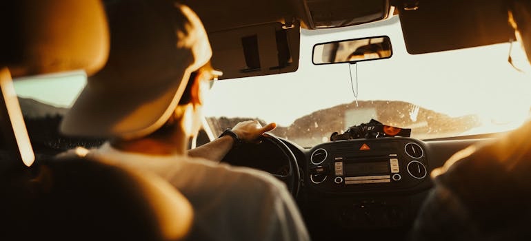 A person driving a car on an open road