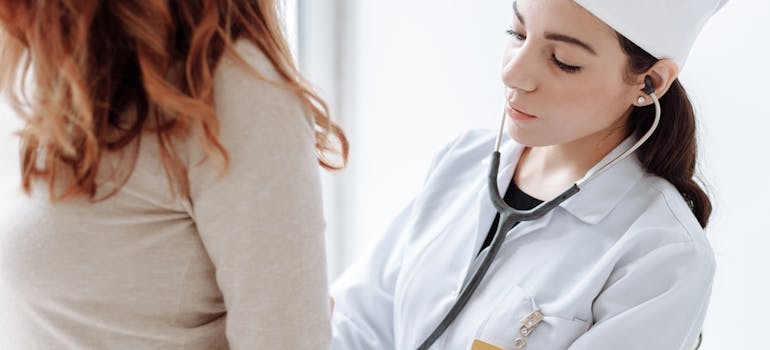 A person talking with a doctor at a medical office