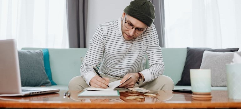 A person budgeting for a move