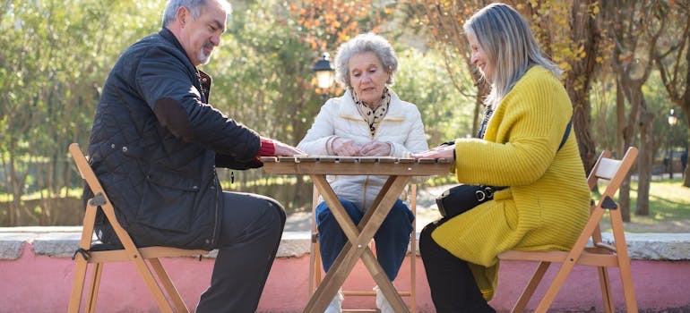 A group of seniors spending time together in a park during their retirement in Tennessee