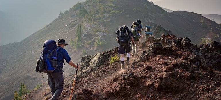 A group of hikers on a mountain trail