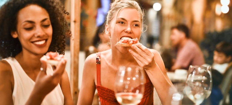 People dining at a restaurant in one of the top Tennessee towns for remote professionals