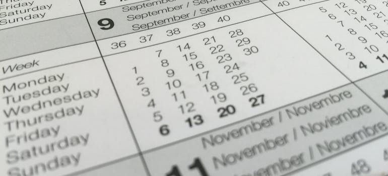 Wall calendar with dates for planning a move