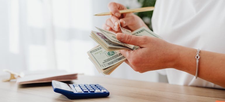 A person counting cash
