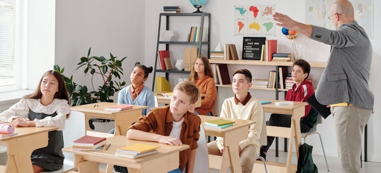 Children sitting in a classroom at school