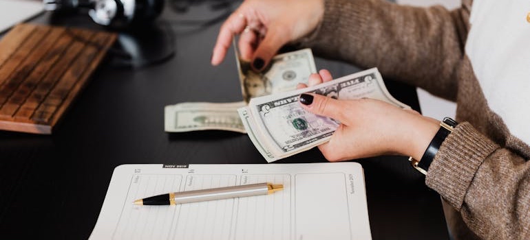 A person budgeting to find rental properties in a competitive market