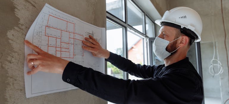 A contractor preparing tools to renovate a home