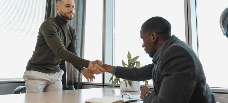 A person meeting with a lender about a mortgage loan