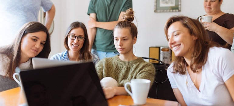 People talking around a table in an office