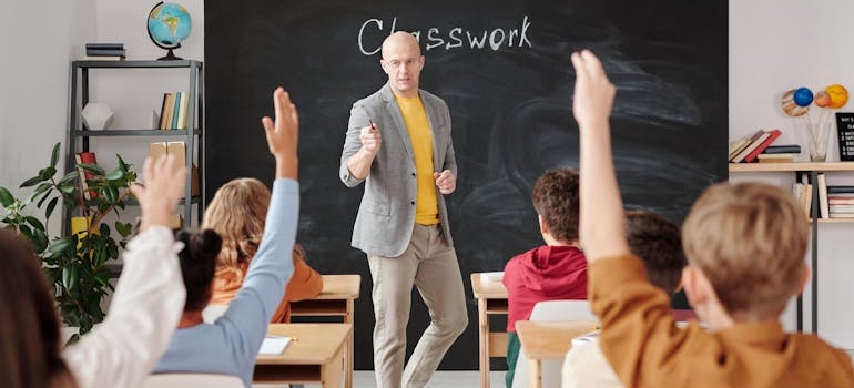 Kids sitting in a classroom during a lesson