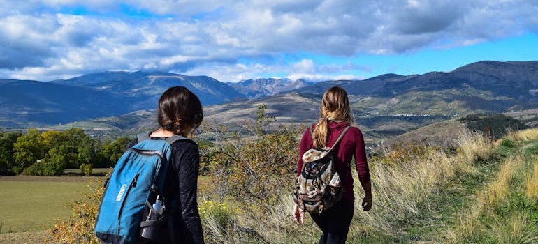 A group of people hiking near Evergreen, one of the quieter mountain towns in Colorado