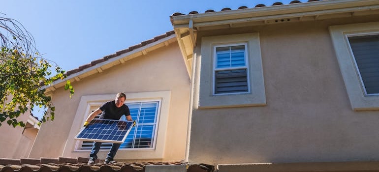 A roofer fixing a roof