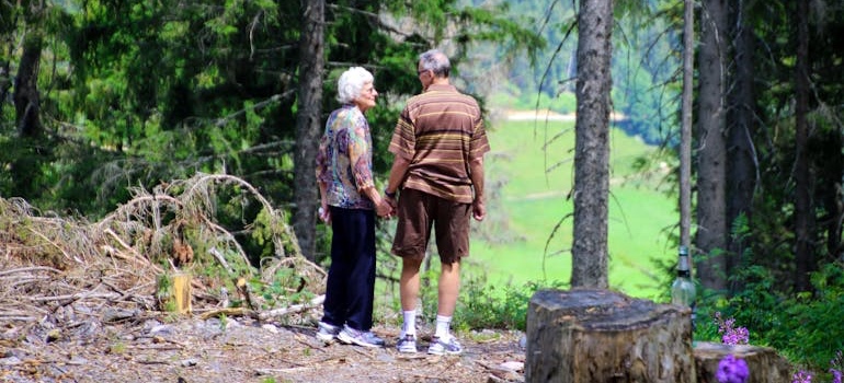 Older adults walking together on a nature trail