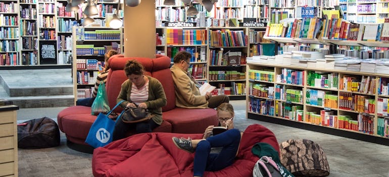 People reading at a public library in Oxford, a no-cost place to spend an afternoon