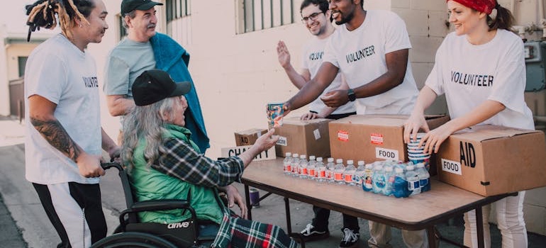 Volunteers taking donations