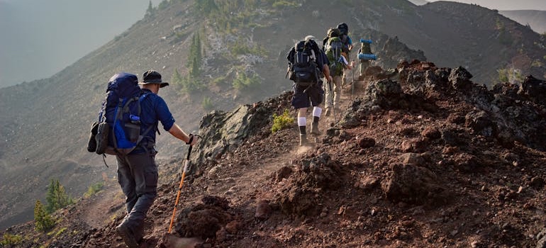 A group of people hiking on a Colorado mountain trail