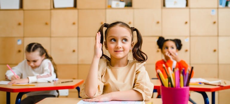 A child taking a lesson at school