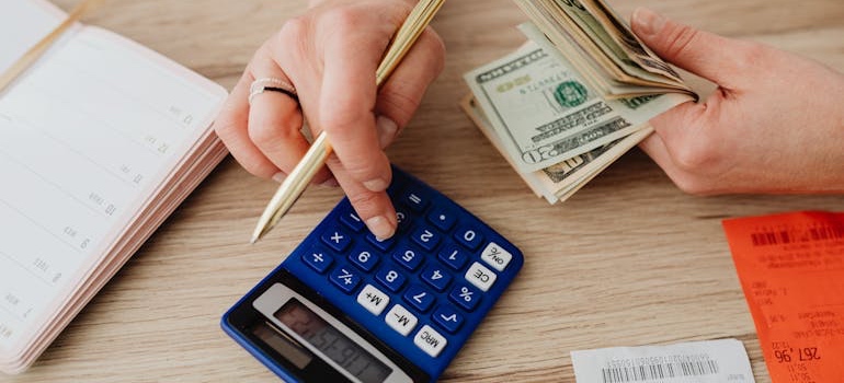 A person working on a budget for moving to NC