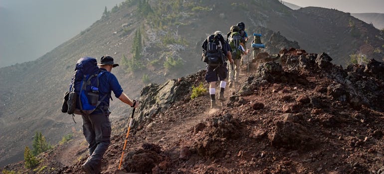 A group of hikers on a mountain trail