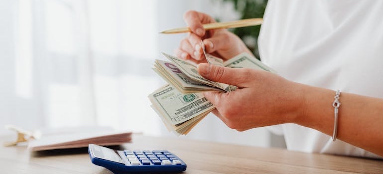 A person planning a monthly budget