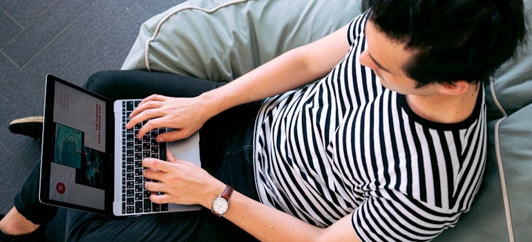 A person using their laptop